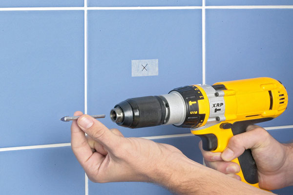 how to drill through tile without damaging the tile