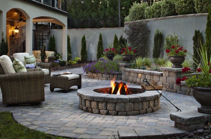 Cobblestone patio with tumbled stone fire pit