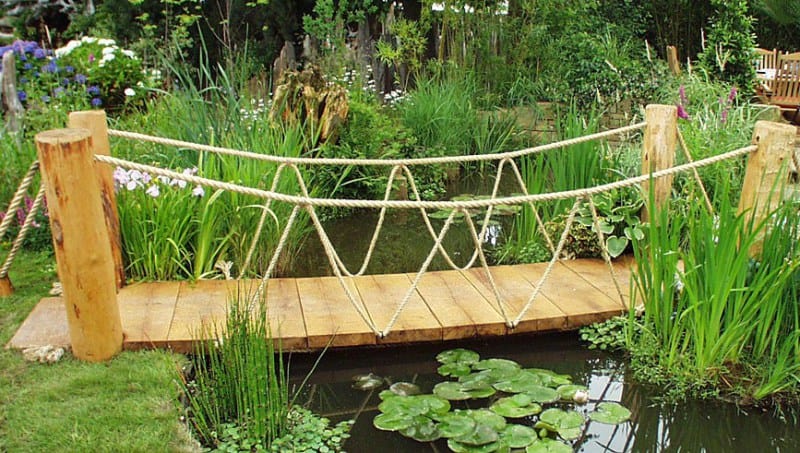 DIY backyard pond with walk bridge