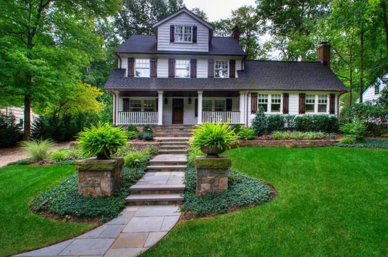 traditional front yard landscaping with pathway entrance