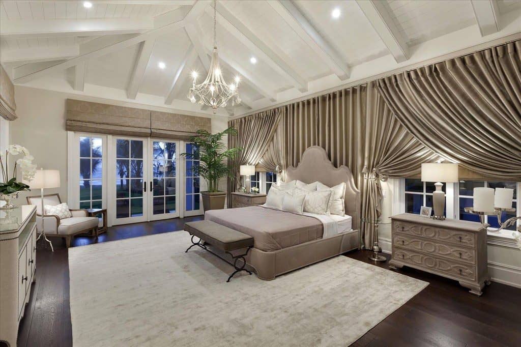 Traditional Master Bedroom with Chandelier & Carpet