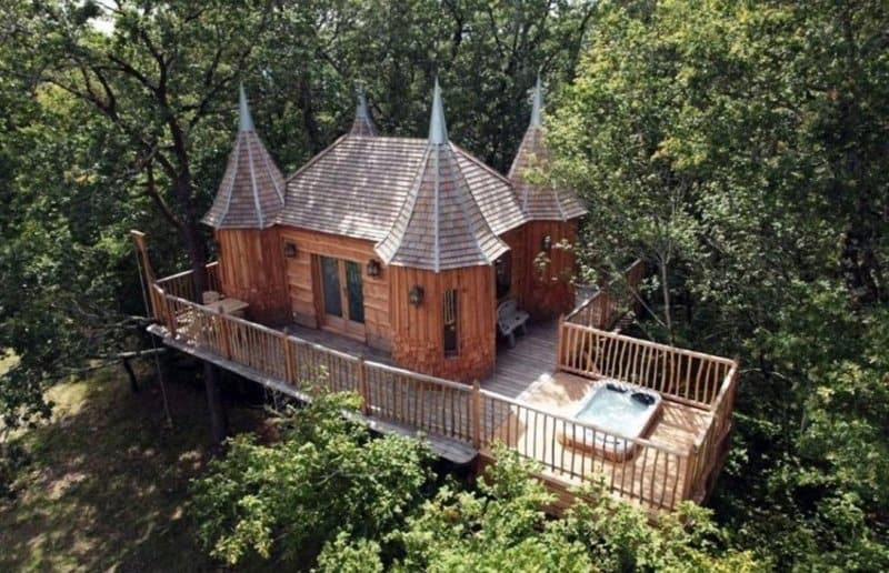 castle style tree house wooden fence