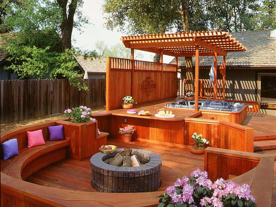 Custom cedar stained deck with pergola and fire-pit