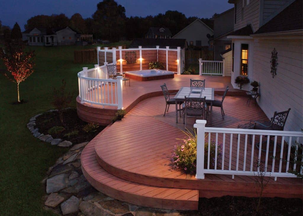 curved wood deck with outdoor lighting