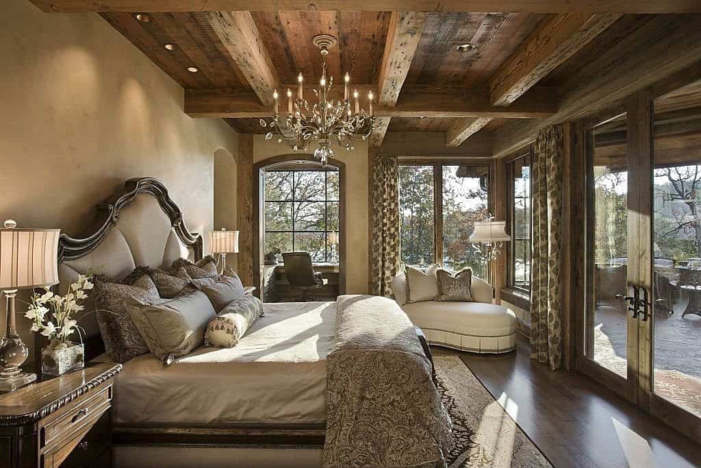 eclectic master bedroom with wood ceiling and exposed rustic wood beams