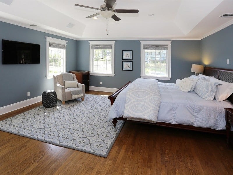 master bedroom with light blue color scheme