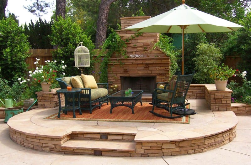 mexican paver style patio with fire pit