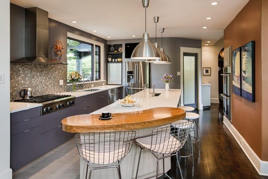 Modern and colorful kitchen with some cool looking fyer pan seats