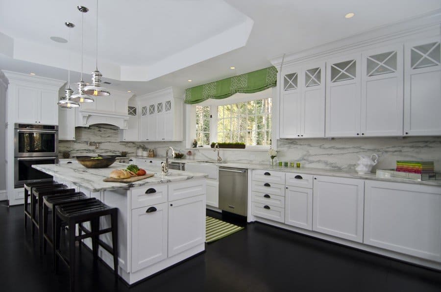 modern white kitchen design with dark flooring