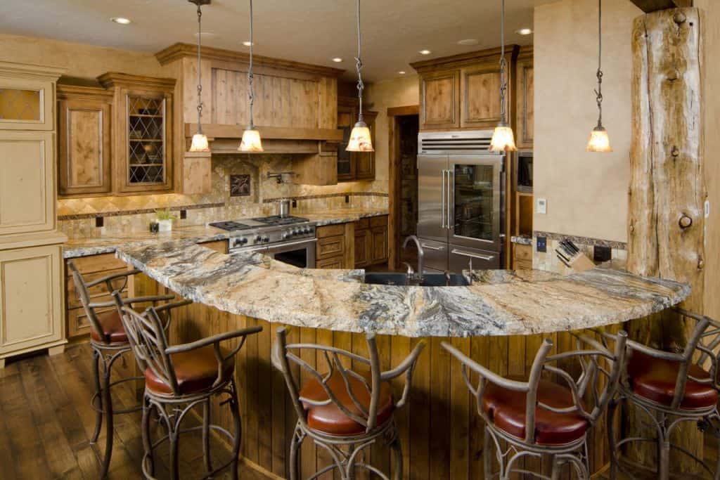 Rustic country style kitchen with cool looking custom chairs
