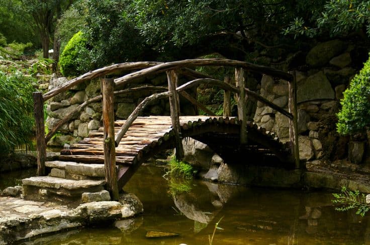 country style rustic arched bridge