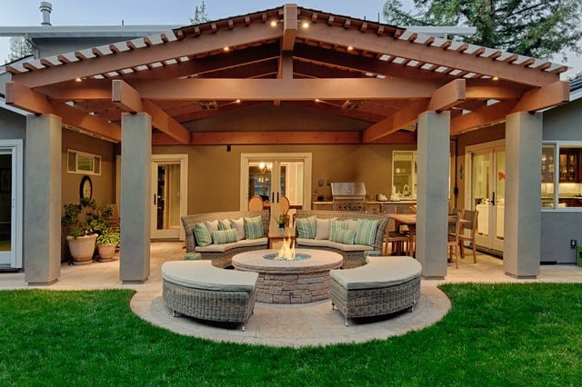 traditional cobblestone patio design for a small backyard