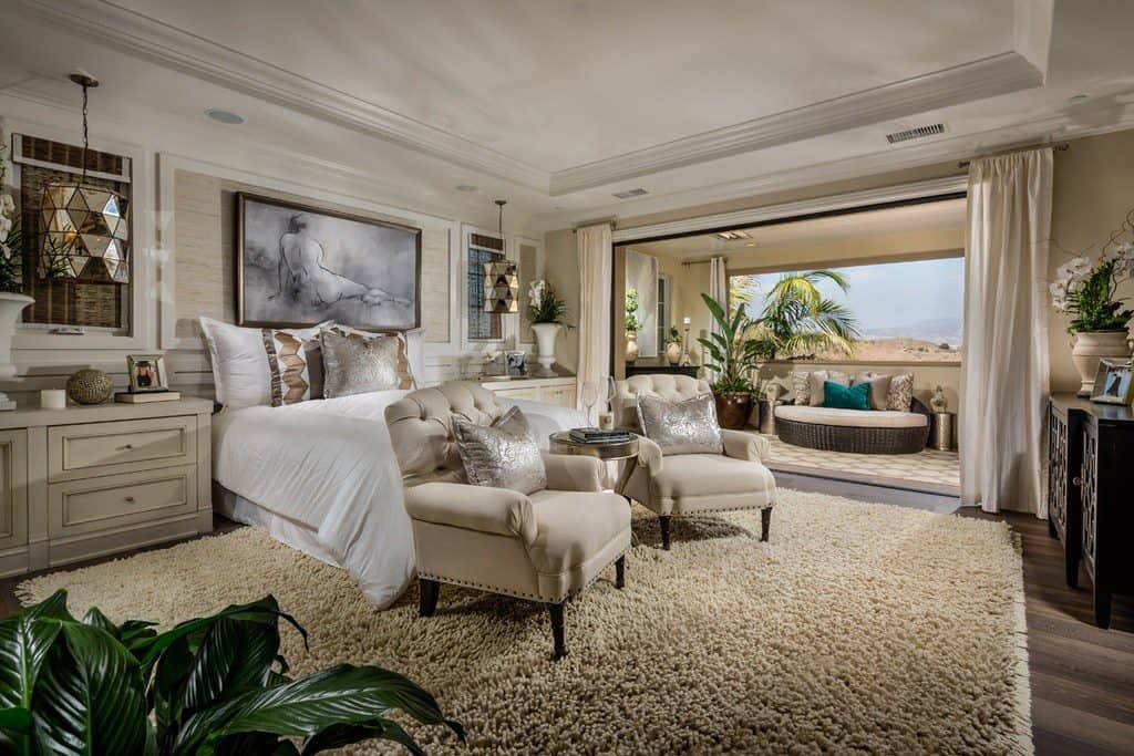Tropical Master Bedroom with Hardwood floors & Pendant lighting