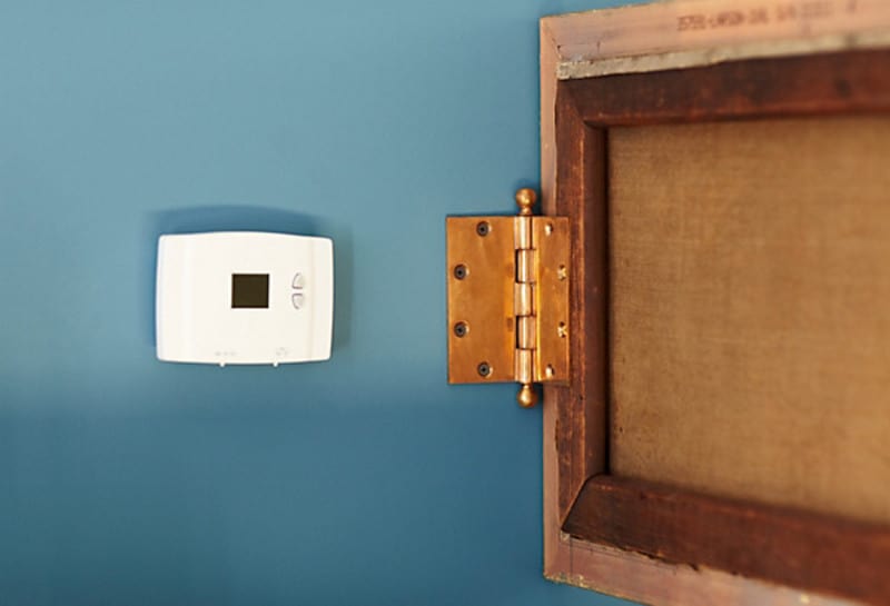 hide thermostat with a picture frame