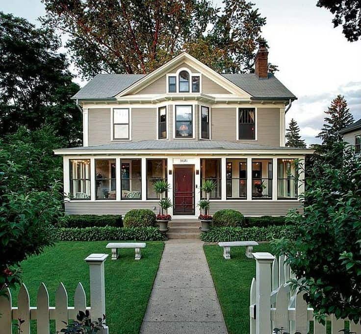 traditional craftsman home with picket fence